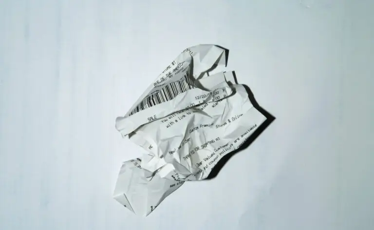 Crumpled paper receipt on a white background