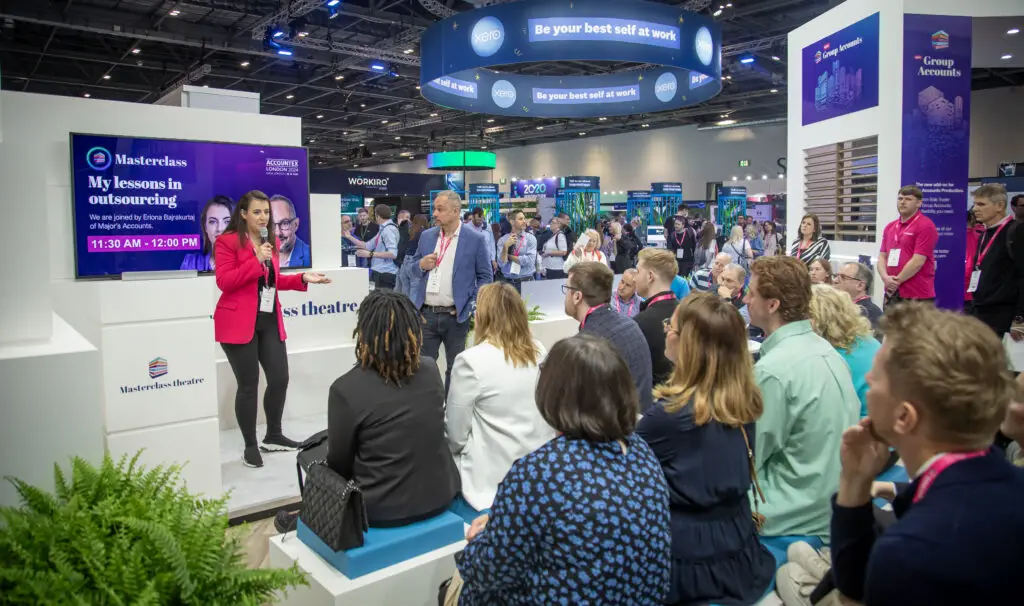 Eriona Bajrakurtaj speaking to an audience at Accountex