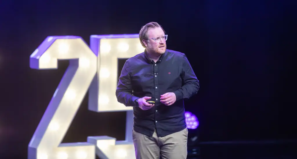 Stu McEwan of FreeAgent speaking on stage at Engager LABS 2025